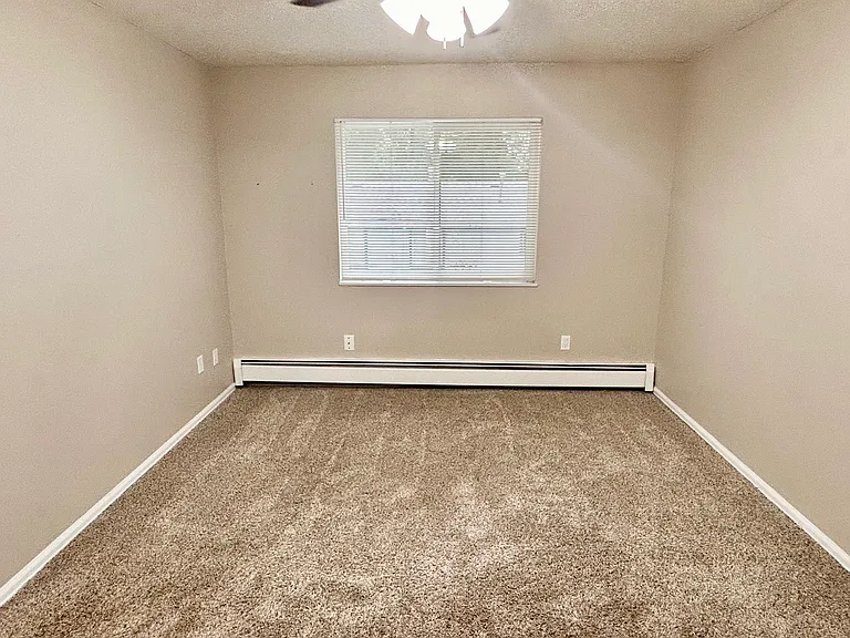 Experience comfort in this inviting bedroom, bathed in natural light. Experience comfort in this inviting bedroom, bathed in natural light.
