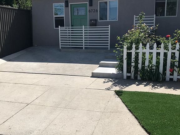 View from sidewalk showing the distance from parking to the front door