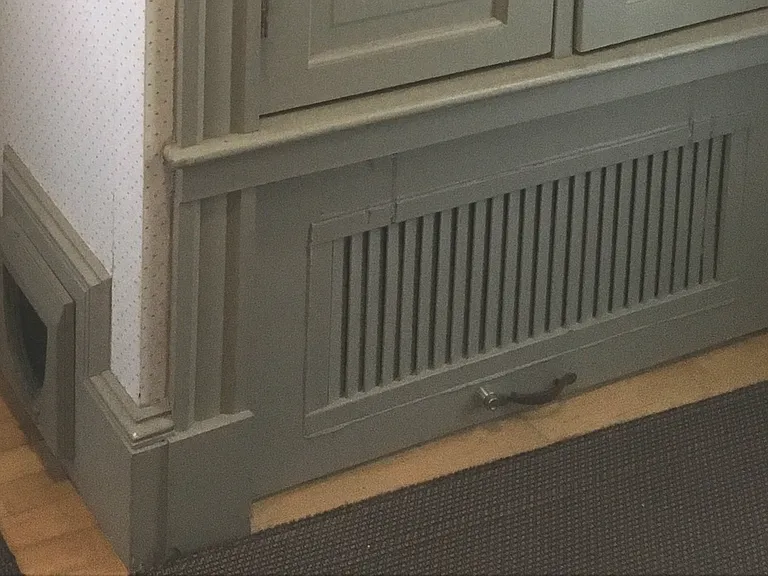 Enclosed cat litter area in pantry (no cats have lived there for eight years)