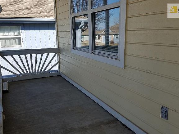 Nice Front Sitting Porch. Ramp to house for wheelchair or easy access.