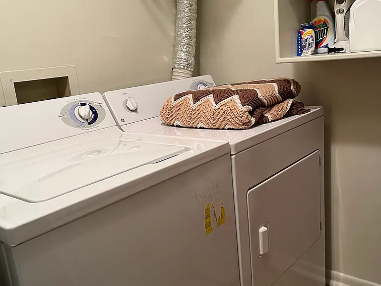 Full size washer and dryer in the unit! The laundry and closet are combined.