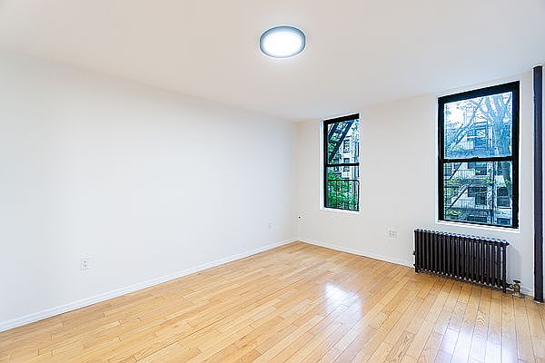 1st image of 319 E 5th St APT 12
