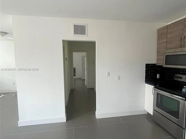 545 NW 121st St — Photo 4