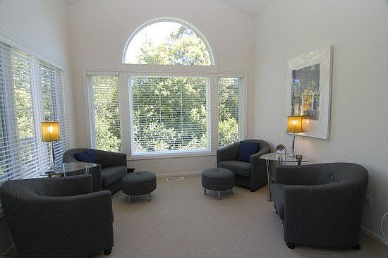 Cozy sunroom w/access to deck, lots of natural light!