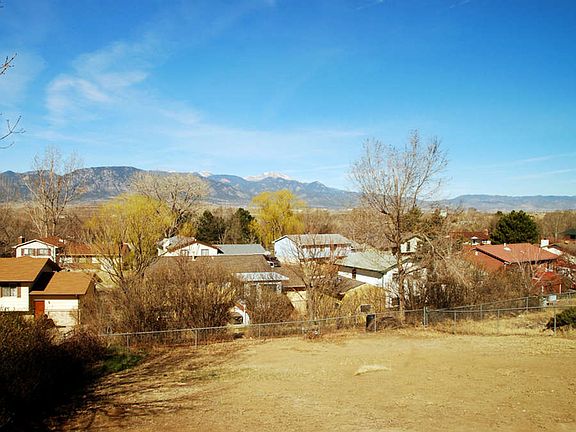 "Enjoy the sweeping views from deck, backyard, kitchen, dining area and master bedroom"