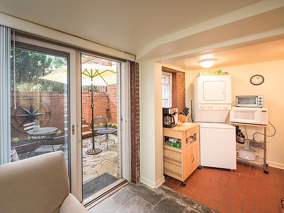 Equipped Kitchen with Washer-dryer, range, frig, coffee maker, microwave and plates, glasses, utensils.