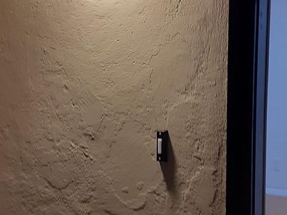 LIGHT AND DOOR BELL IN THE PORCH