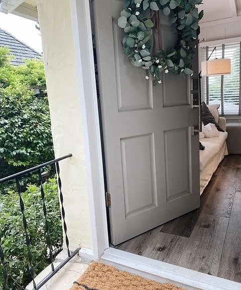 Private front door that is tucked away from street view