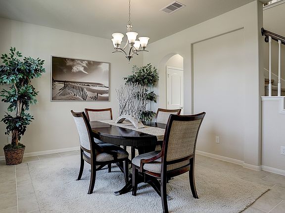 Dining room tucked off foyer