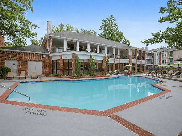 Pool Side Relaxing Area Surrounded by Trees