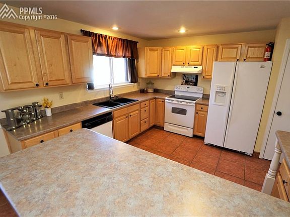 Remodeled Kitchen has pantry closet and plenty of storage.