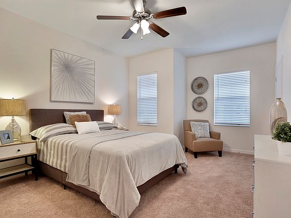 The secluded master bedroom comes with its own full bathroom and walk-in closets