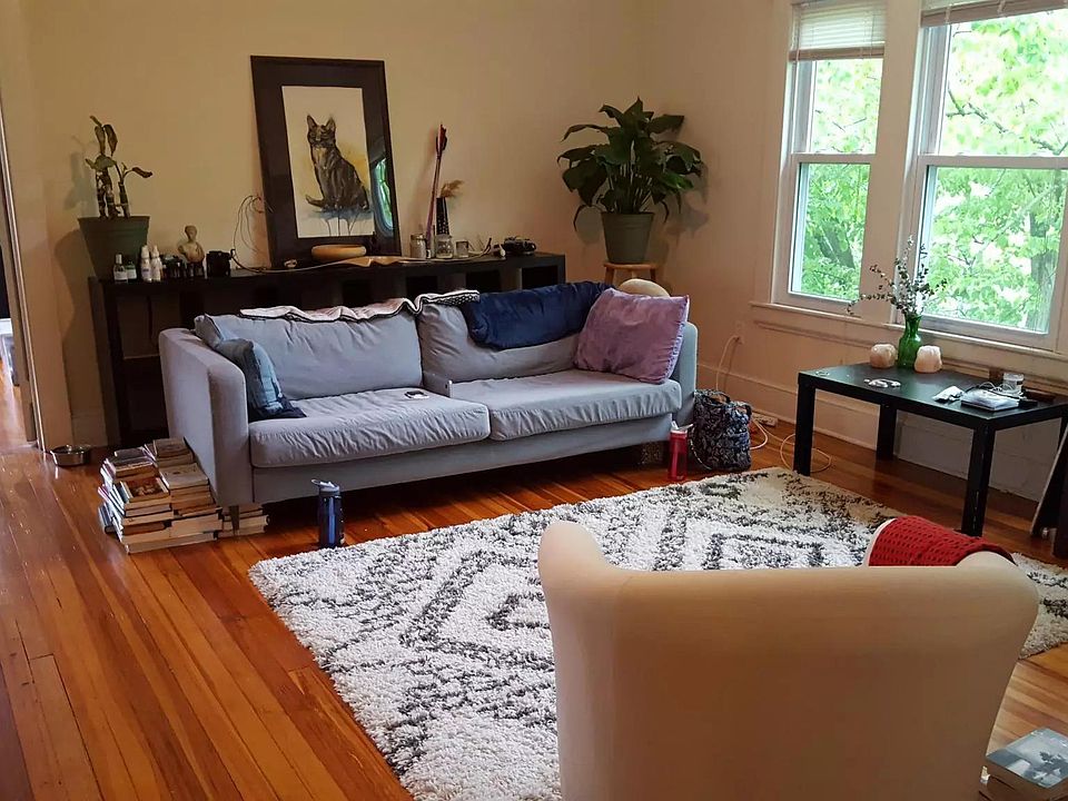 Living room has view of West Rock when the leaves are off the trees.
