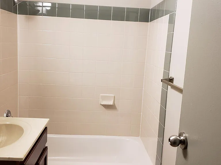 Bathroom with ceramic tile surround
