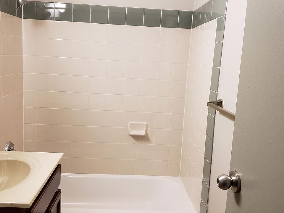 Bathroom with ceramic tile surround