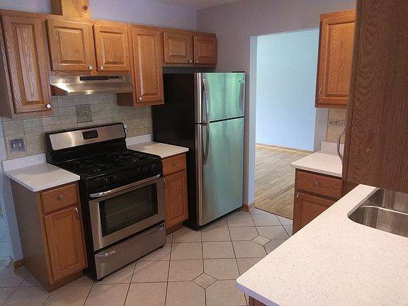 SS Frigidaire Oven, Fridge. New Broan SS exhaust fan. New quarts countertop!