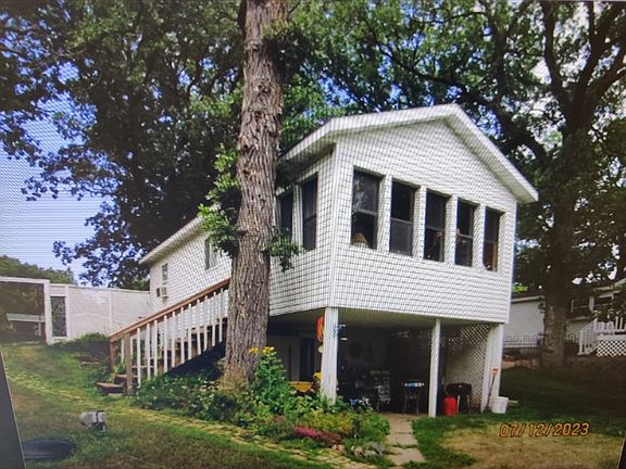 two story: 1 bd., 1 bath, three season porch
