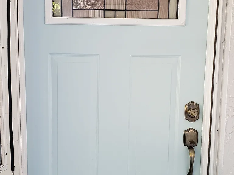 Front Entry Door with Tiffany Window Insert.