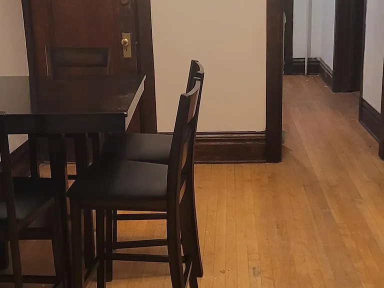 Dining area located near kitchen and living rooms