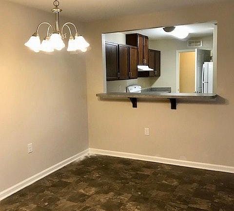 Dining area with ass through to kitchen