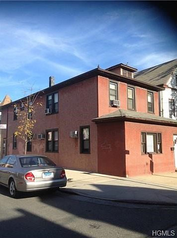 Brick ; Side view of house!!!!! BIG AND WORTH INCOME