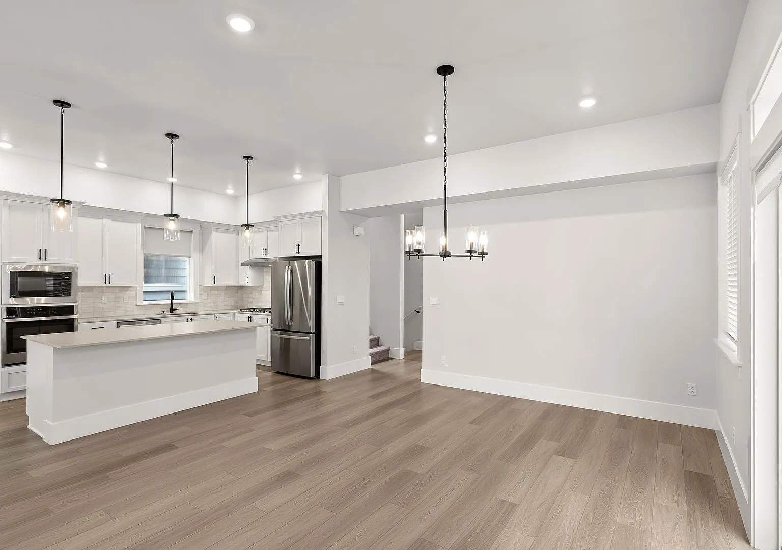 Welcome to Modern Living in this beautifully designed 4-bedroom, 2.5 bath home! — Photo 3