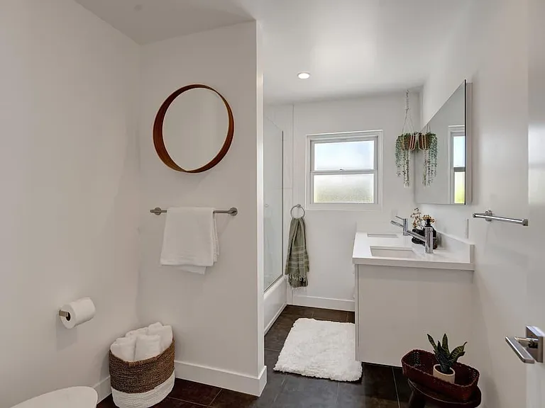 Main bathroom off hall with bathtub and shower