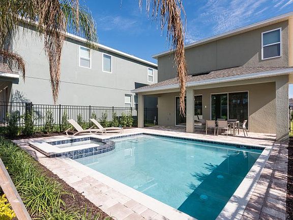 The swimming pool in the back yard(C)