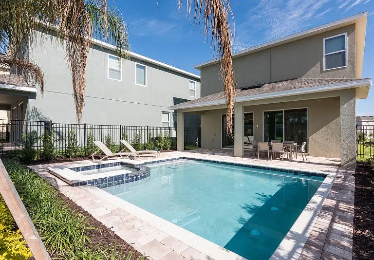The swimming pool in the back yard(C)