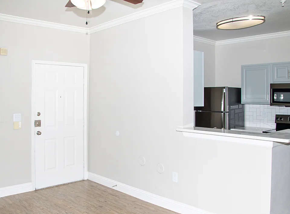Spacious living room with neutral finishes and open layout