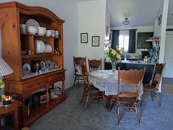 Dining area with beautiful china cabinet.