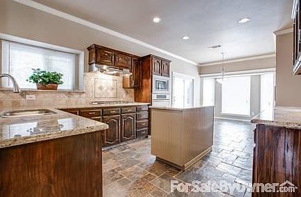 All Granite with Custom Slate Flooring : Granite & Stone backsplash, stainless gas cooktop, New 60/4