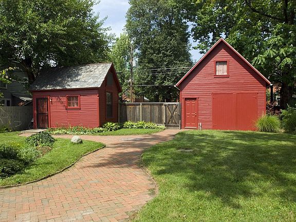 View from screened porch of workshop and 2 car garage