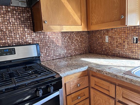 Newer kitchen with Mother of Pearl backsplash.