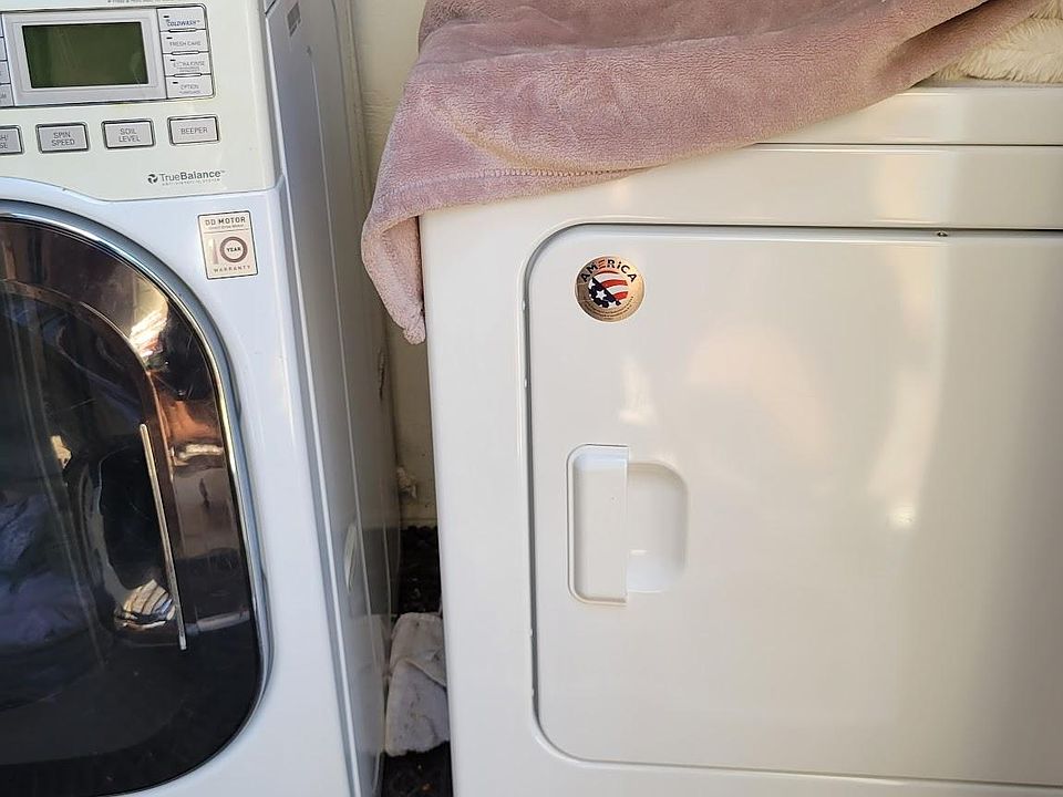 Washer and Dryer in Building Laundry Room