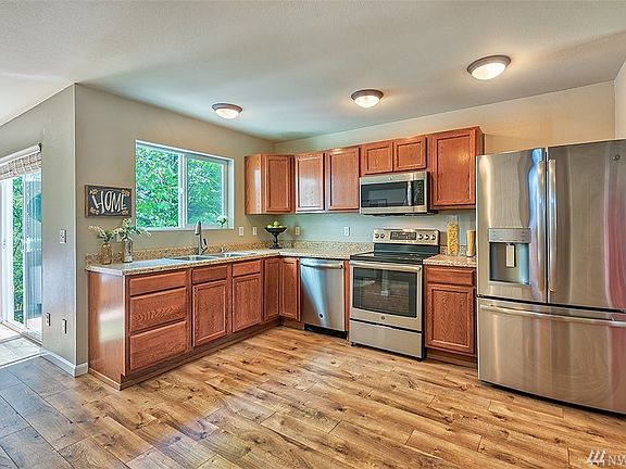 Brand New Stainless Steel Appliances!  Kitchen Cabinets Have Been Refinished And Look New.....Inside And Out!  New Kitchen Sink 