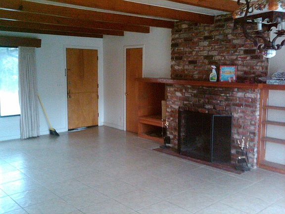 tiled living room with fireplace