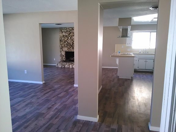 Front entry leads to the Living Room, Family Room and Kitchen