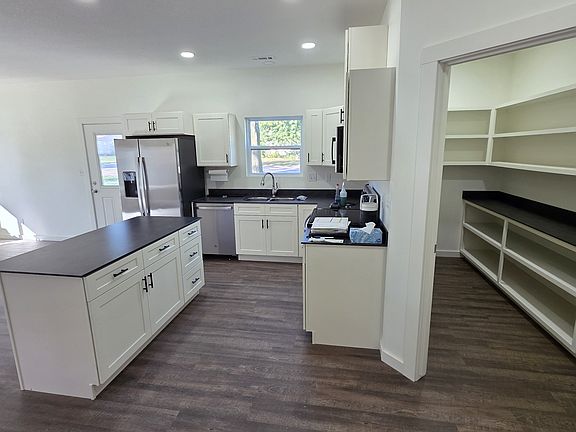 Kitchen on left, Walkin Pantry on right