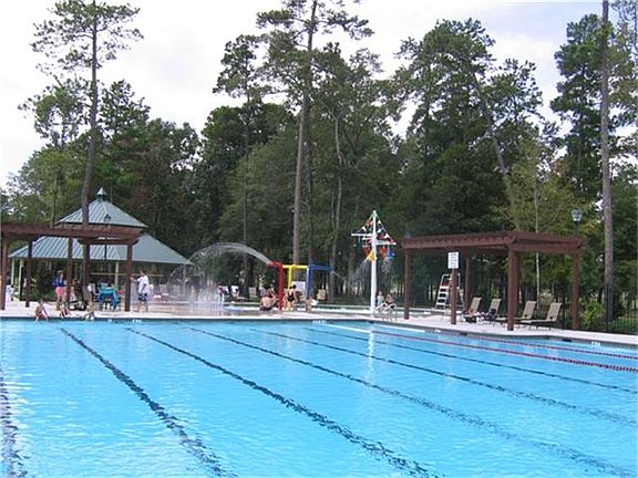 Enjoy the pool and splashpad at the Clubhouse for Benders Landing Estates.