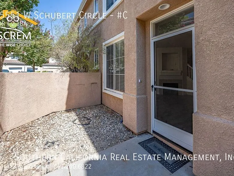 25551 W Schubert Cir #C — Photo 2