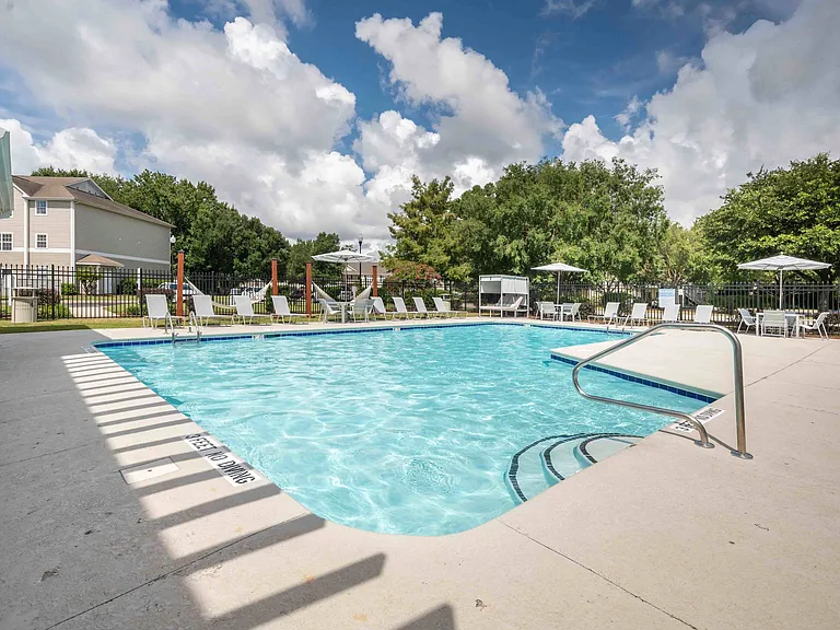 Sparkling Swimming Pool with a Sun Deck