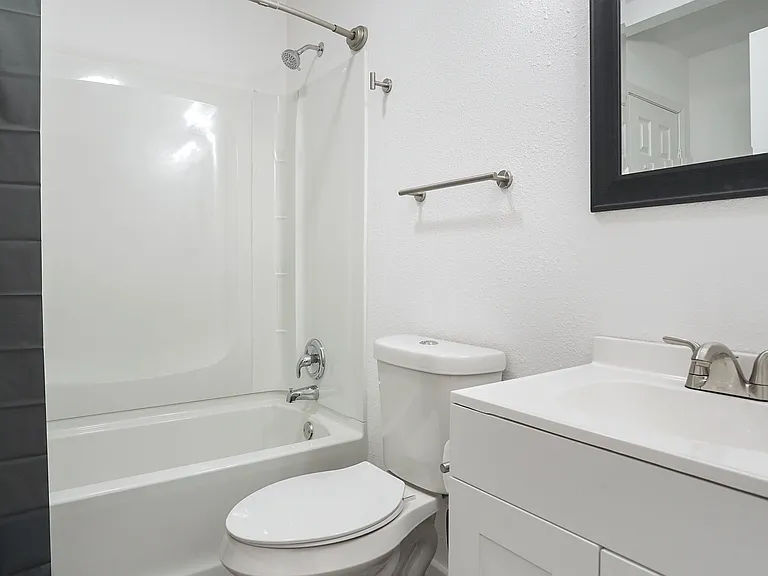 Bright and open bathroom w/ lots of closet space