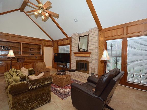 Large wall of built-ins in the block panelled den!