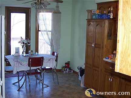 Kit. Eating area from Din. Rm.