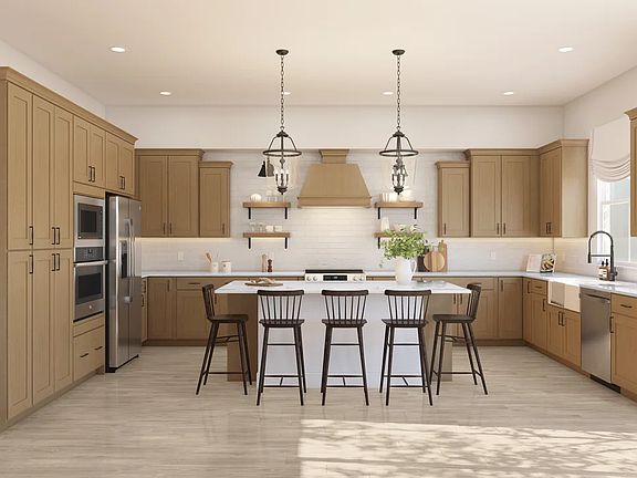 Kitchen with vast island pendant lights