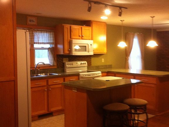 View to kitchen from dining