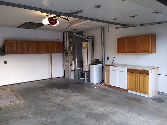 Two car garage showing HVAC unit