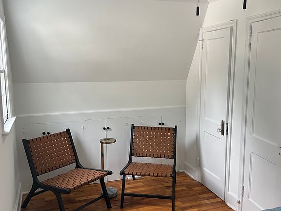 Additional storage and seating area in second bedroom, chairs included!