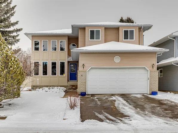 4 W Wood Valley Rise SW, Calgary, AB T2W 5X5